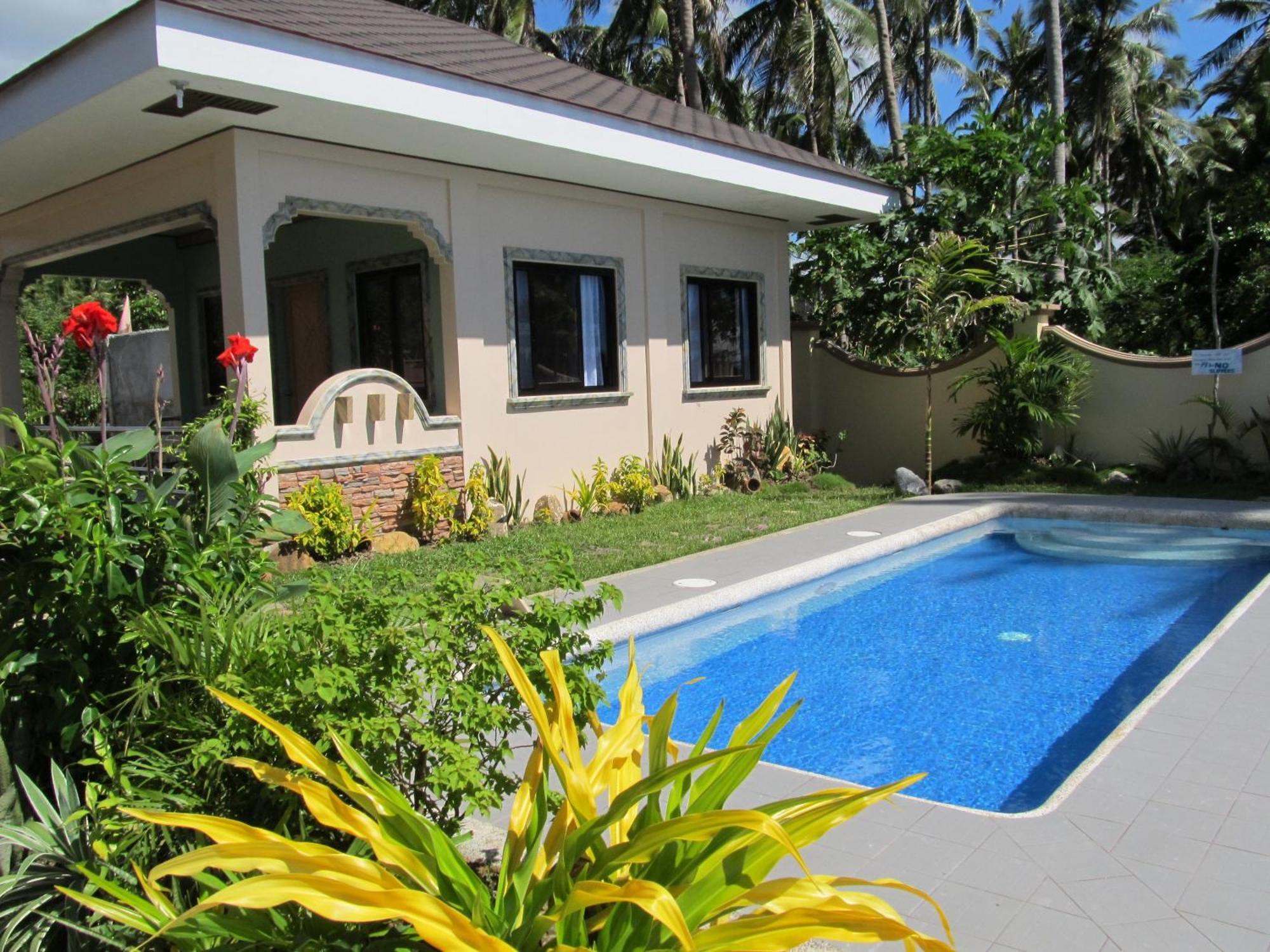 Ucoy Beach Resort Libertad Exterior photo